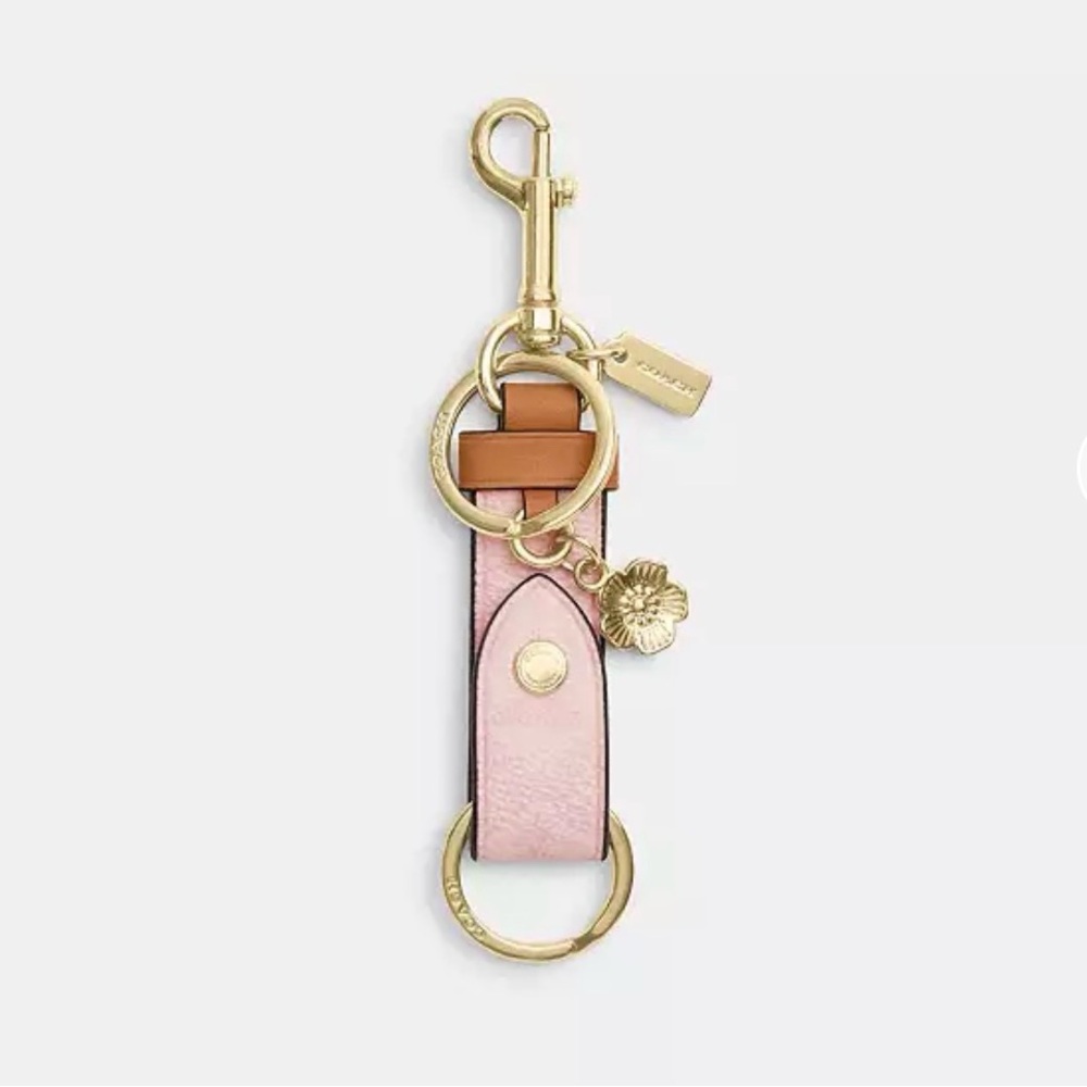 Coach Powder Pink Trigger Snap Bag Charm In Signature Canvas With Flower Charm